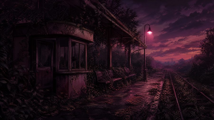 An overgrown railway platform at dusk with an abandoned ticket booth and one lit lamp